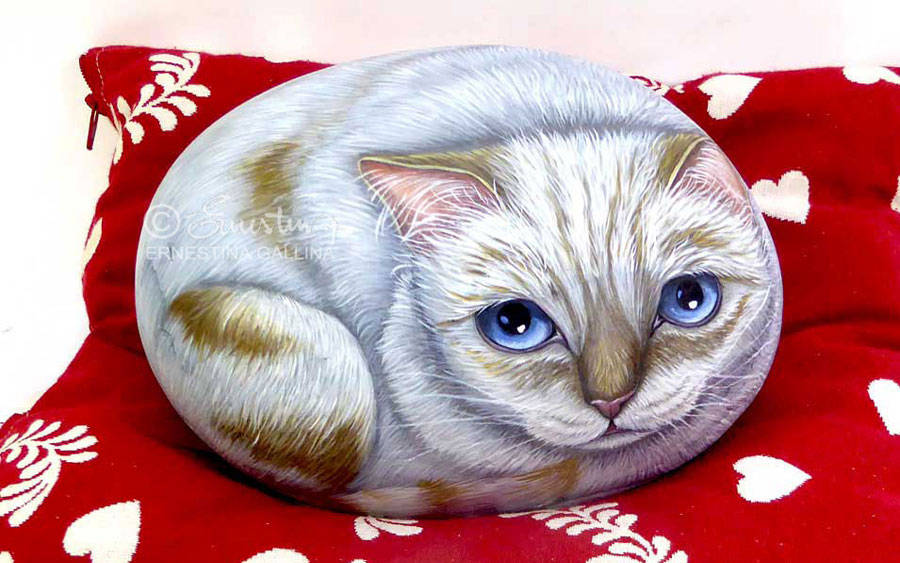 Gattina bianca dipinta su pietra naturale in 3D