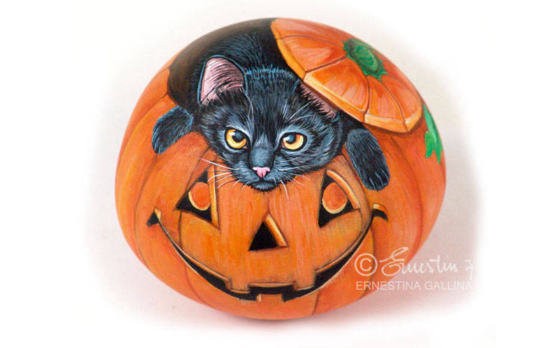 Zucca di Halloween con gatto nero